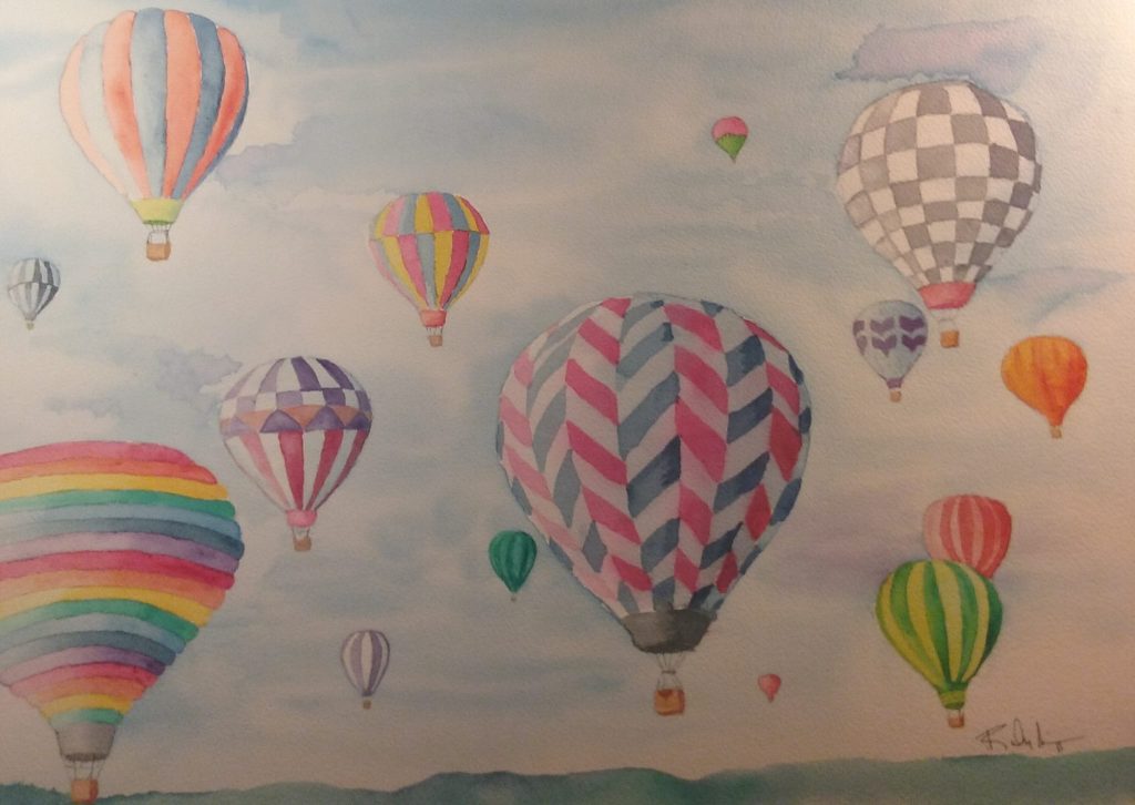 A watercolor painting of a hot air balloon launch